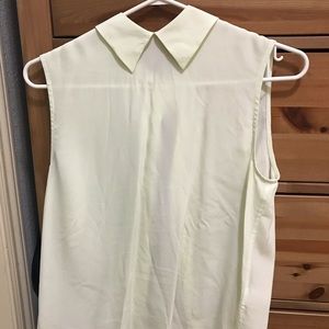 Like new Equipment silk mint sleeveless blouse. XS